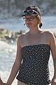 milla jovovich puts her baby bump on display in a bathing suit 02