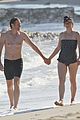 milla jovovich puts her baby bump on display in a bathing suit 03
