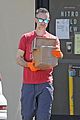 freddie prinze jr takes extra precaution at the post office 01