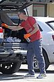 freddie prinze jr takes extra precaution at the post office 02