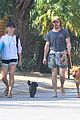 aaron taylor johnson barefoot walk with dogs 05