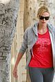 charlize theron red shirt workout 04