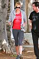 charlize theron red shirt workout 10