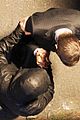 tom cruise jeremy renner hug it out 08