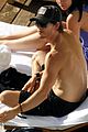 ryan kwanten shirtless sunbathing in hawaii 01
