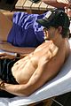 ryan kwanten shirtless sunbathing in hawaii 03