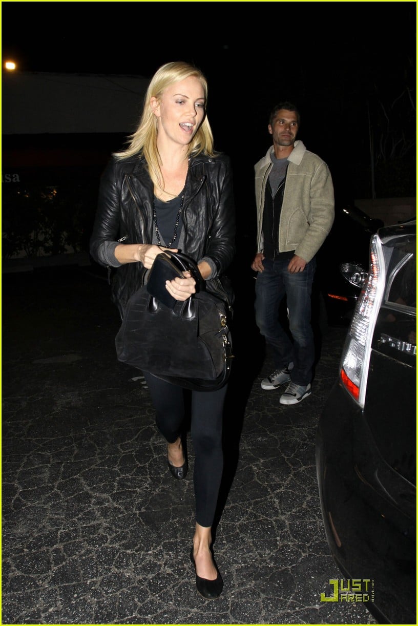 charlize theron dines with a mystery male 012524474