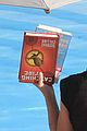 reese witherspoon reads catching fire in rio 07