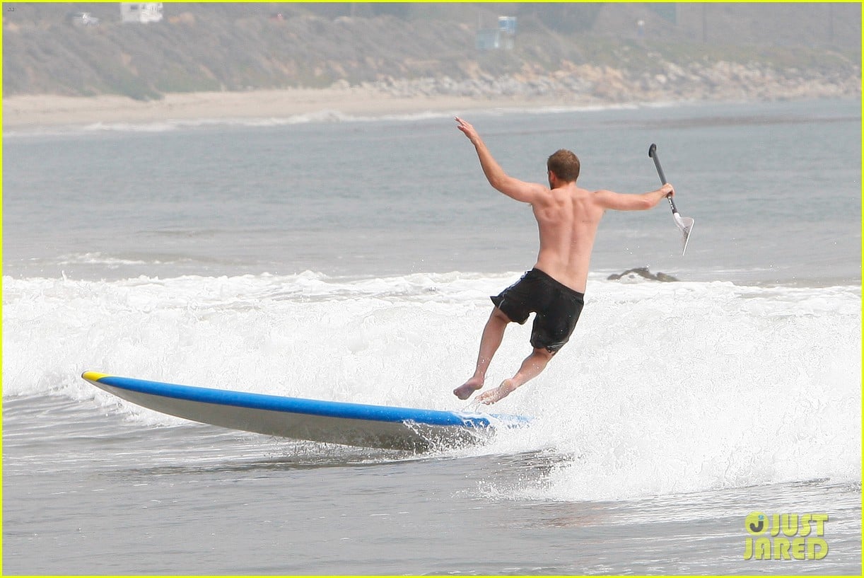 robert pattinson shirtless paddleboarding 032644756