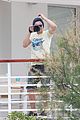 zac efron taking pics at cannes 01