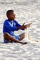 madonnas kids frolick the beach in tel aviv 19