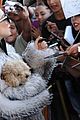 lady gaga signs autographs outside hotel 02