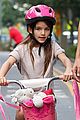 katie holmes teaches suri cruise to ride a bike 04