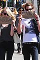 emma stone andrew garfield promote charities with handmade signs 08