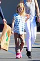 gwyneth paltrow chris martin toys r us with the kids 02