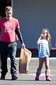 gwyneth paltrow chris martin toys r us with the kids 06