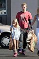 gwyneth paltrow chris martin toys r us with the kids 17