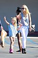 gwyneth paltrow chris martin toys r us with the kids 18