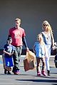 gwyneth paltrow chris martin toys r us with the kids 20