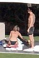 jennifer aniston bikini sunbathing with shirtless justin theroux 16
