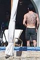 jennifer aniston bikini sunbathing with shirtless justin theroux 19