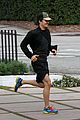 orlando bloom sprints to his car after shopping 08