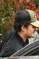 orlando bloom sprints to his car after shopping 11