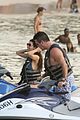 simon cowell jet skiing with former fiancee mezhgan hussainy 04