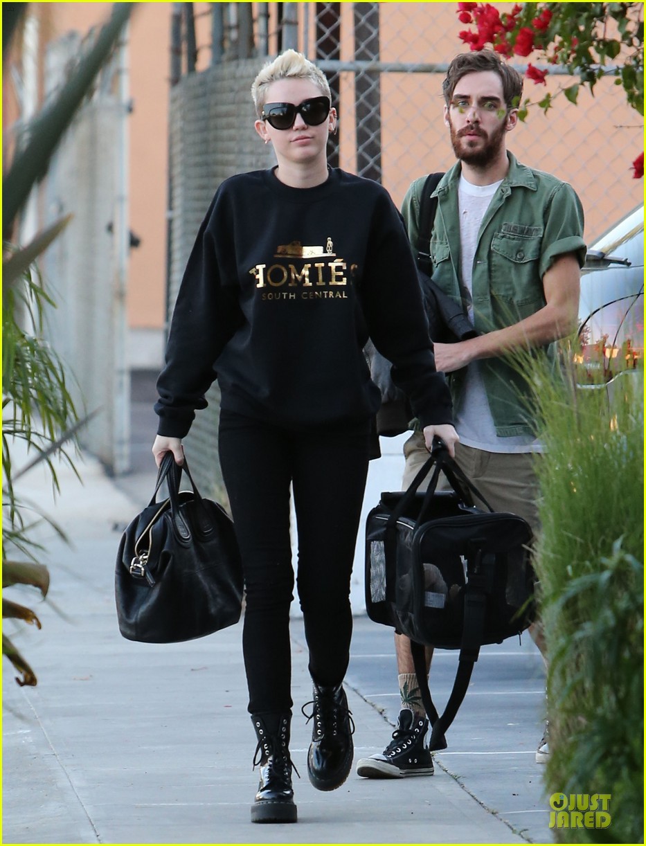 miley cyrus recording studio session with pet pooch bean 01