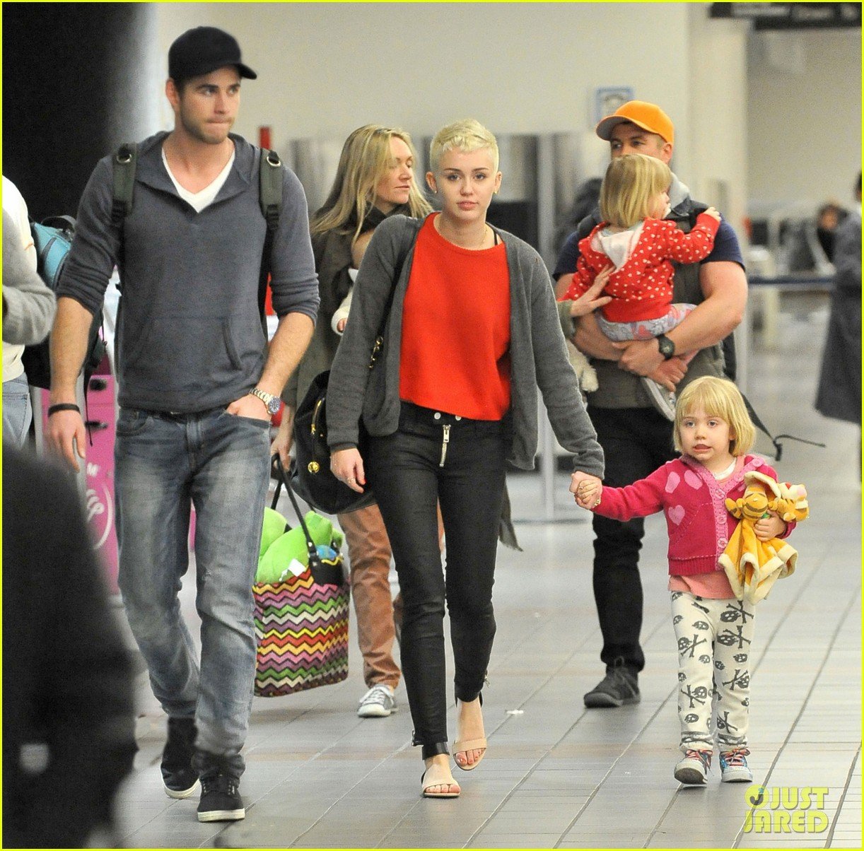 miley cyrus liam hemsworth take flight with the family 03