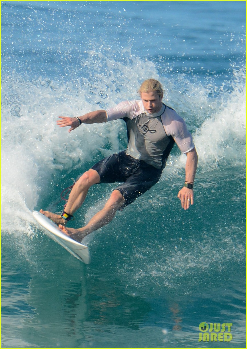 chris liam hemsworth shirtless surfing duo 262799403
