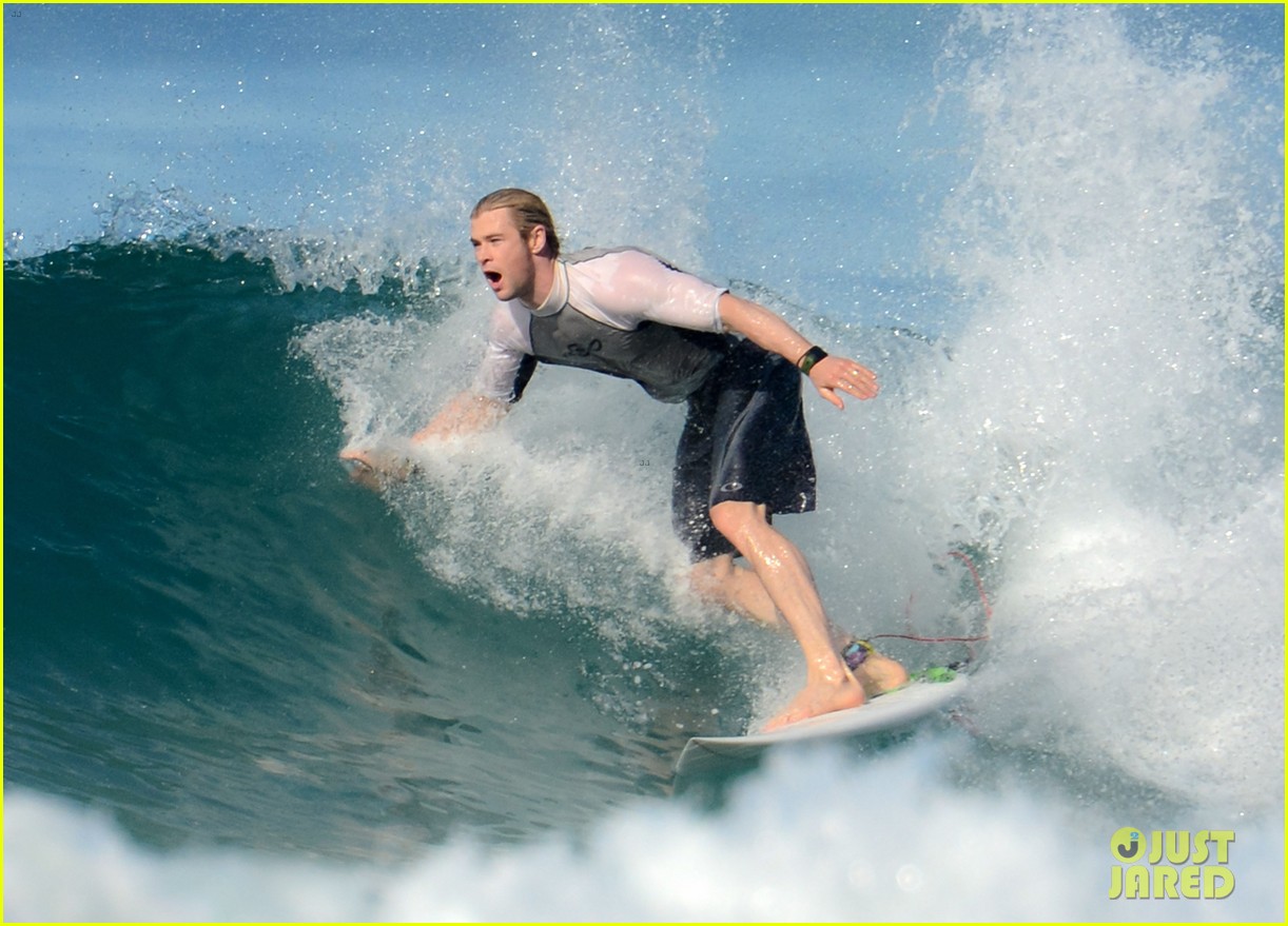 chris liam hemsworth shirtless surfing duo 28