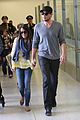 lea michele cory monteith holding hands at lax 09