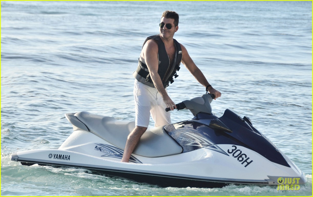 simon cowell shirtless new years eve with mezhgan huissany 24