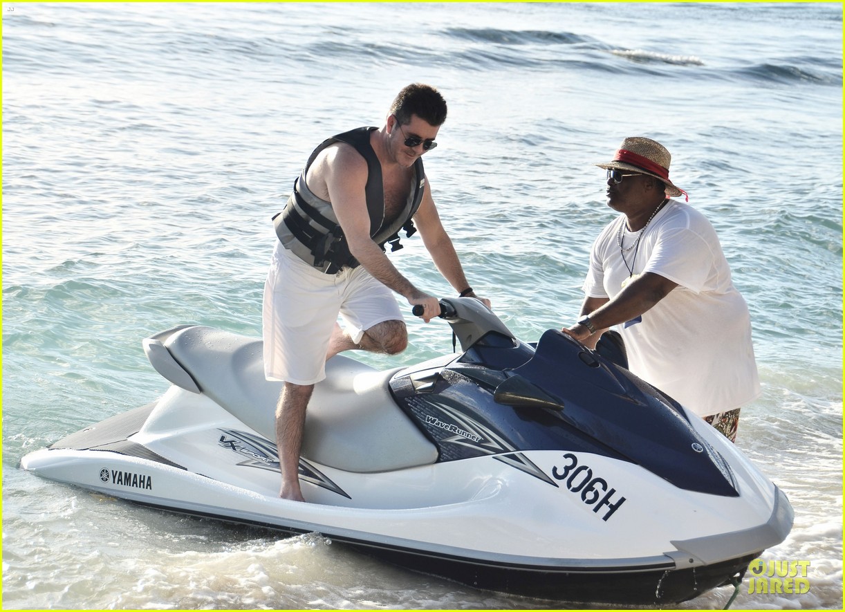 simon cowell shirtless new years eve with mezhgan huissany 25