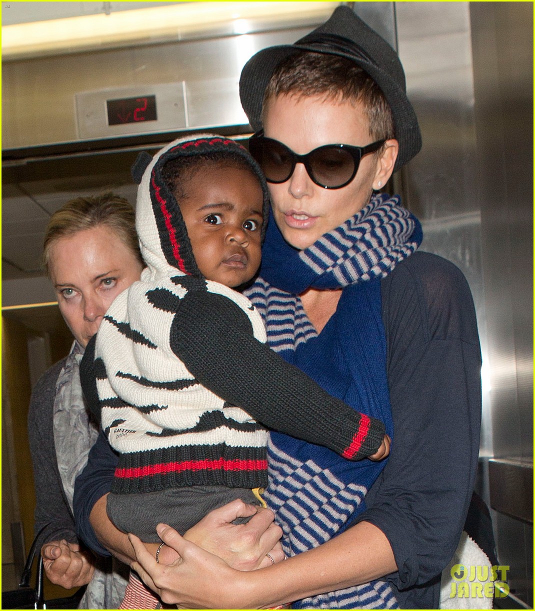 charlize theron lax arrival with jackson 042786102