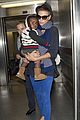 charlize theron lax arrival with jackson 02