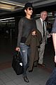 halle berry covers baby bump at lax 01