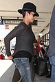 halle berry covers baby bump at lax 02
