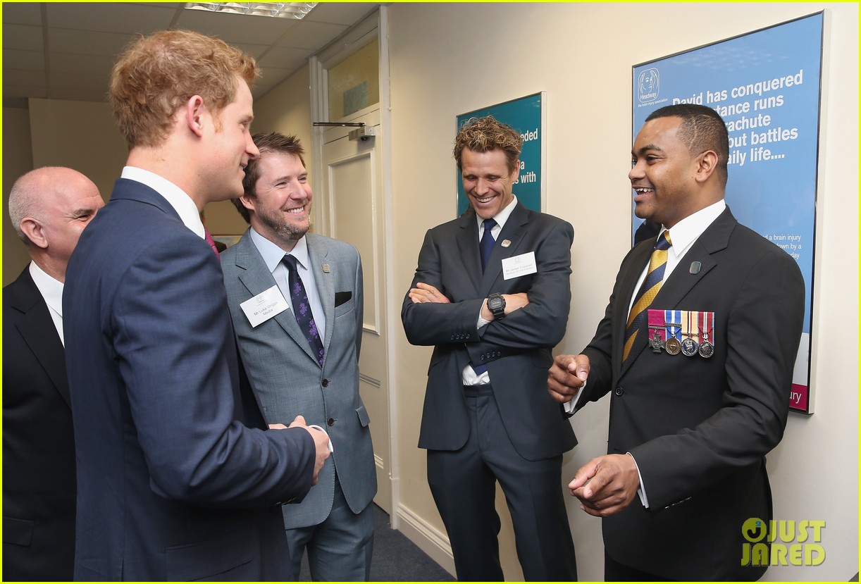 prince harry learns diaper changing at charity event 05