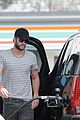 liam chris hemsworth filling up on gas groceries 07