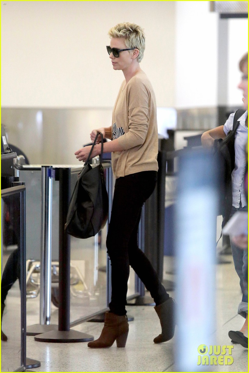 charlize theron zebra sweater at the airport 072852150