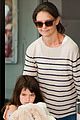 katie holmes and suri return from florida 05