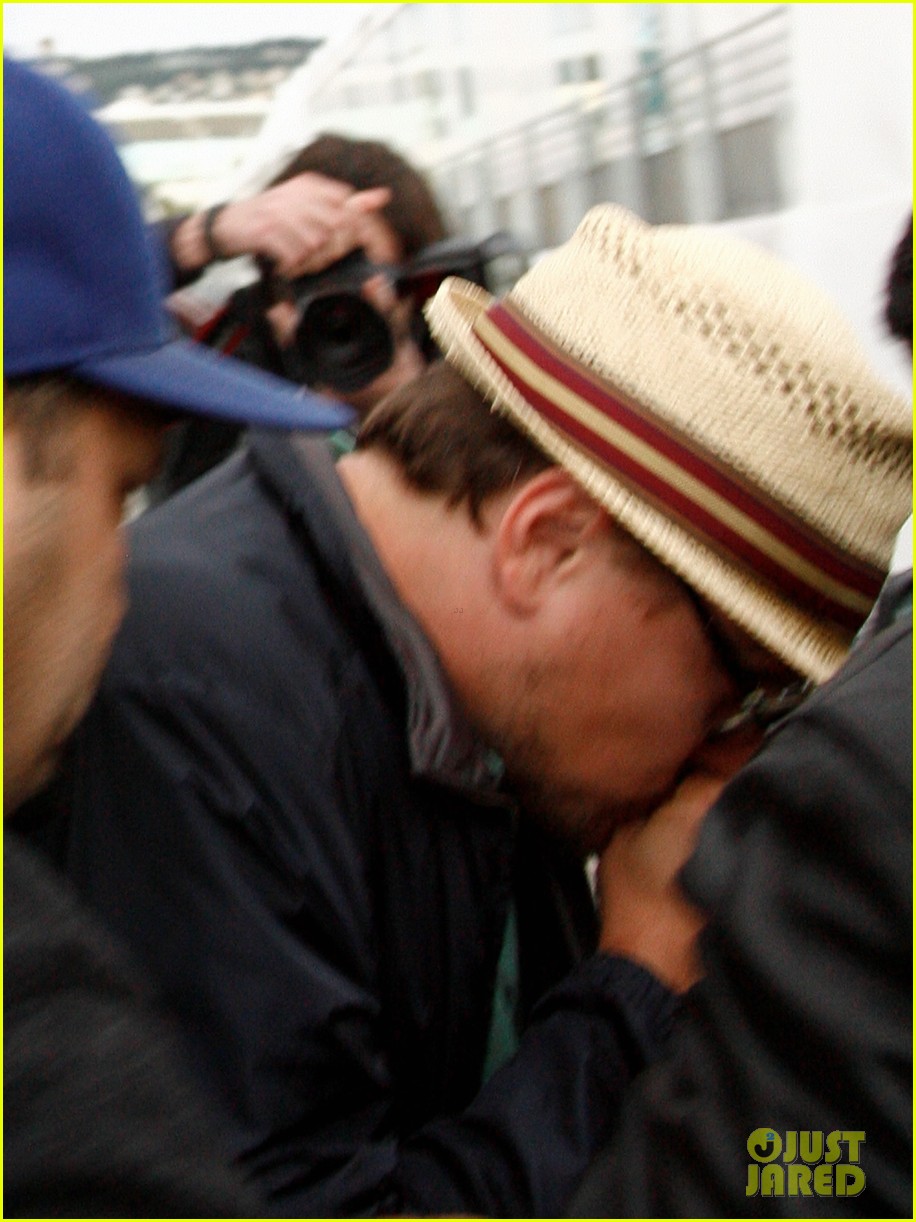 leonardo dicaprio hides face after clubbing at cannes 042874493