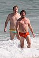 zach galifianakis ed helms shirtless beach day with bradley cooper 02
