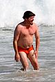 zach galifianakis ed helms shirtless beach day with bradley cooper 29