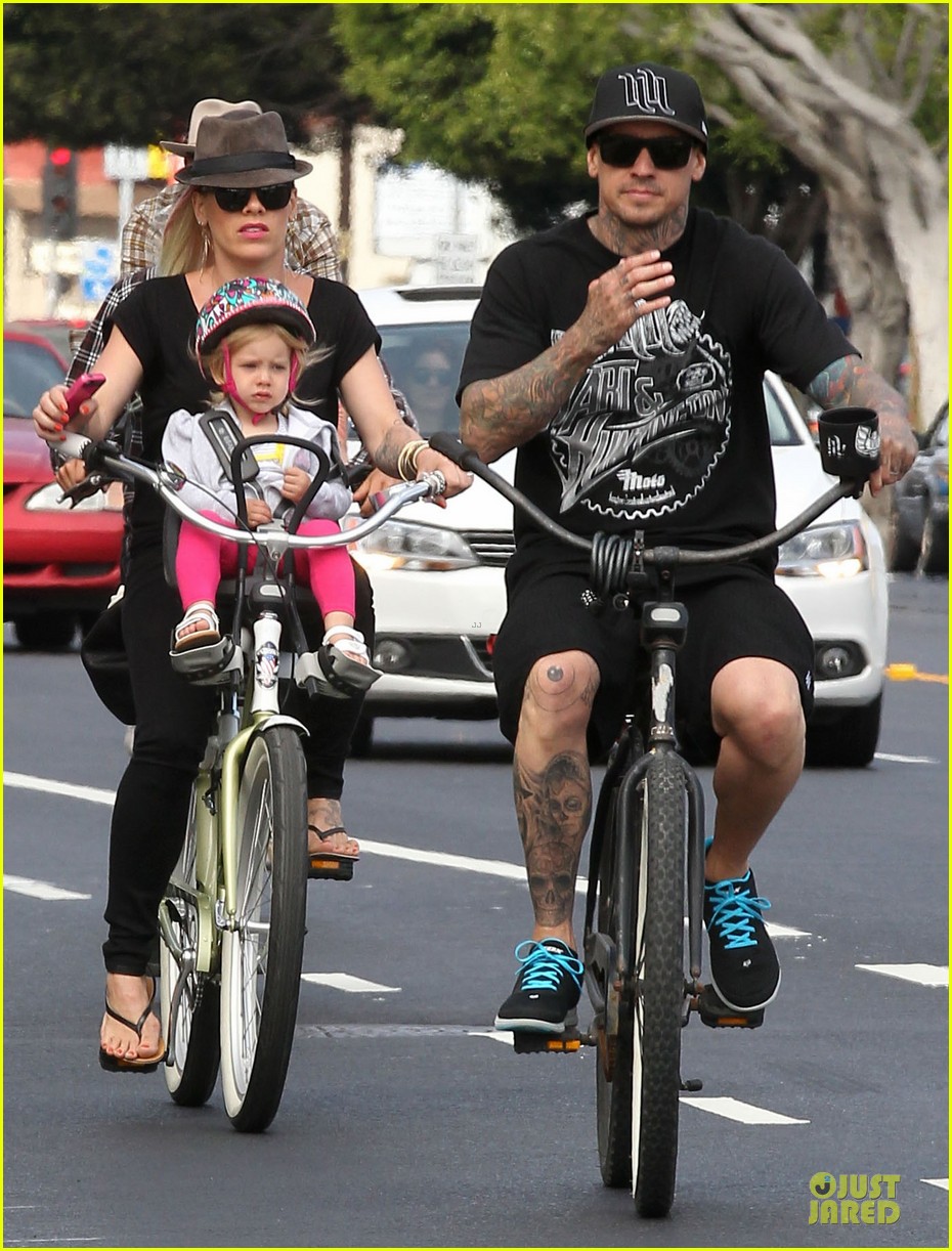 pink carey hart bike riding with willow 16
