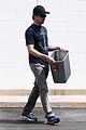 jeremy renner picks up office supplies take out food 01