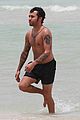pete wentz shirtless beach day with bronx meagan camper 07