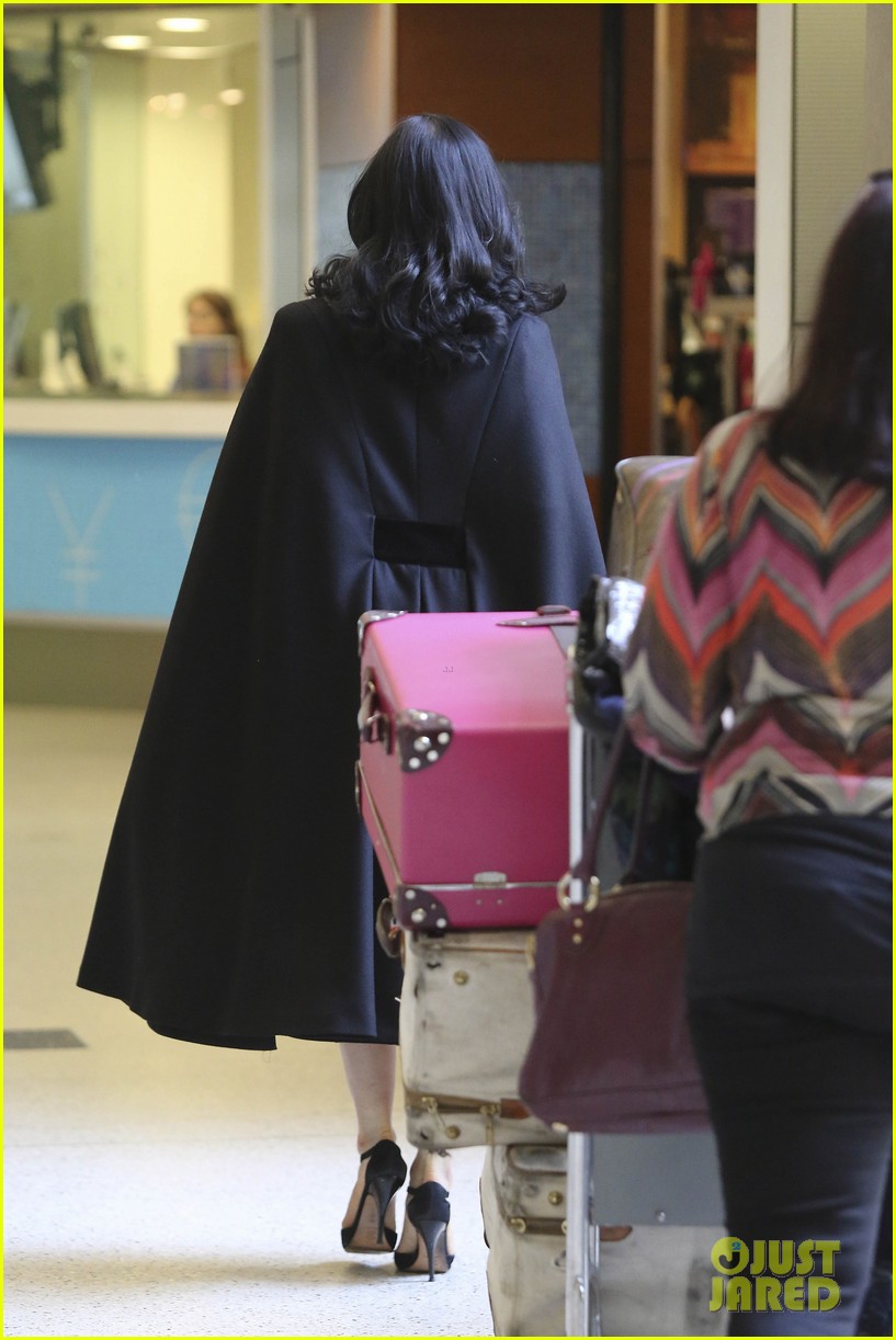 dita von teese wears cape for flight to buenos aires 072912286